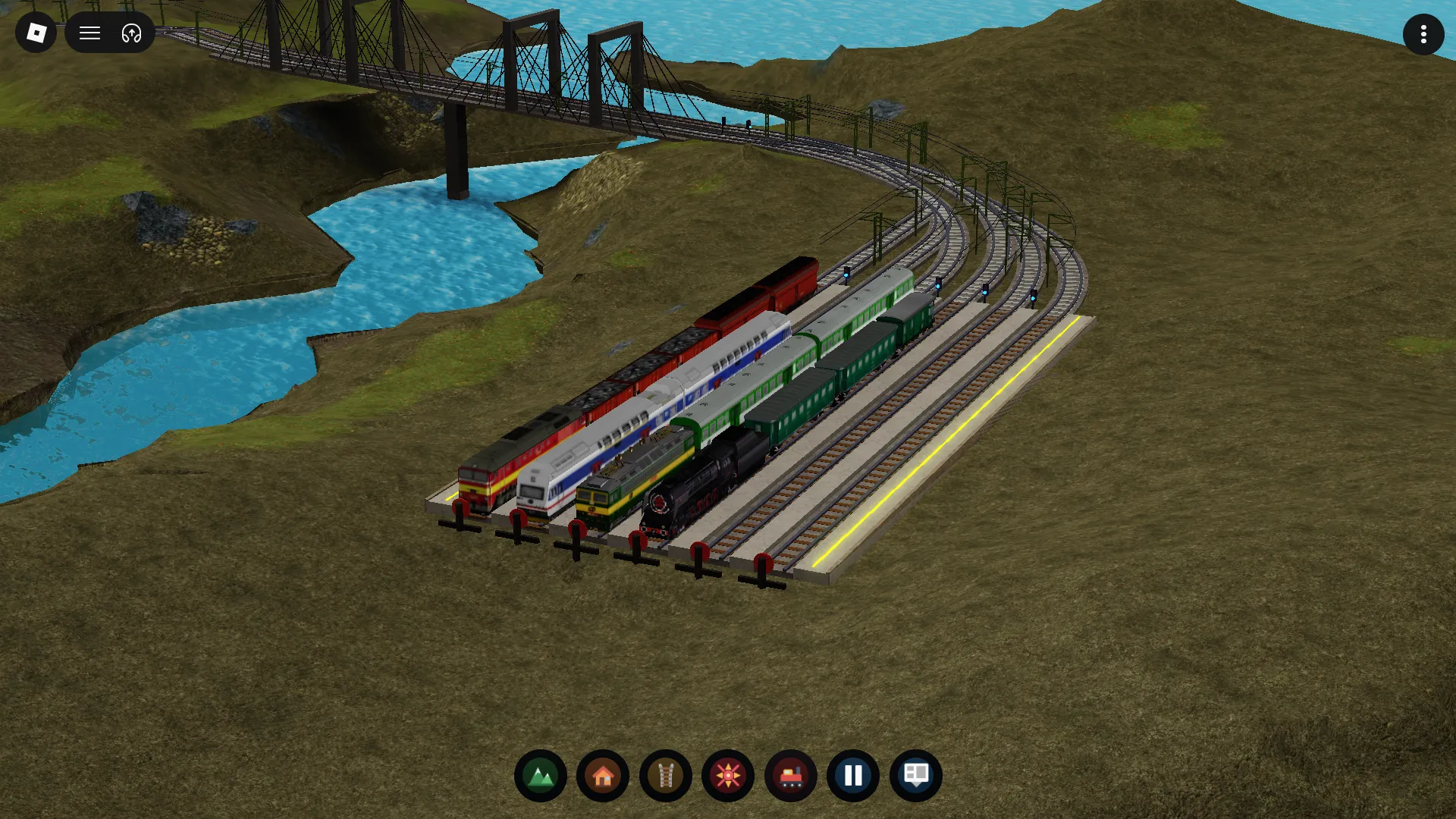 A rail yard and bridge junction show how busy a player-built network can become.